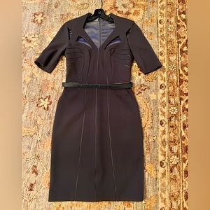 Dress with cut outs. Size 4, Side Pockets and Belt